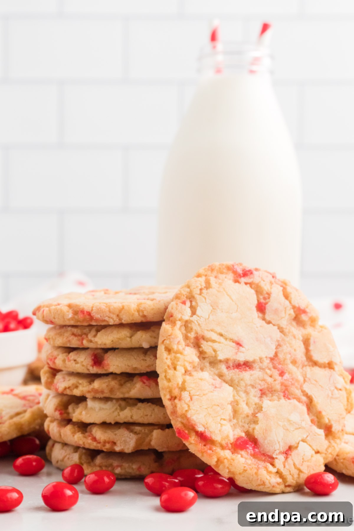 Sizzling Indulgences 10 A stack of freshly baked Red Hot Cookies, showing their crinkled tops and inviting color.