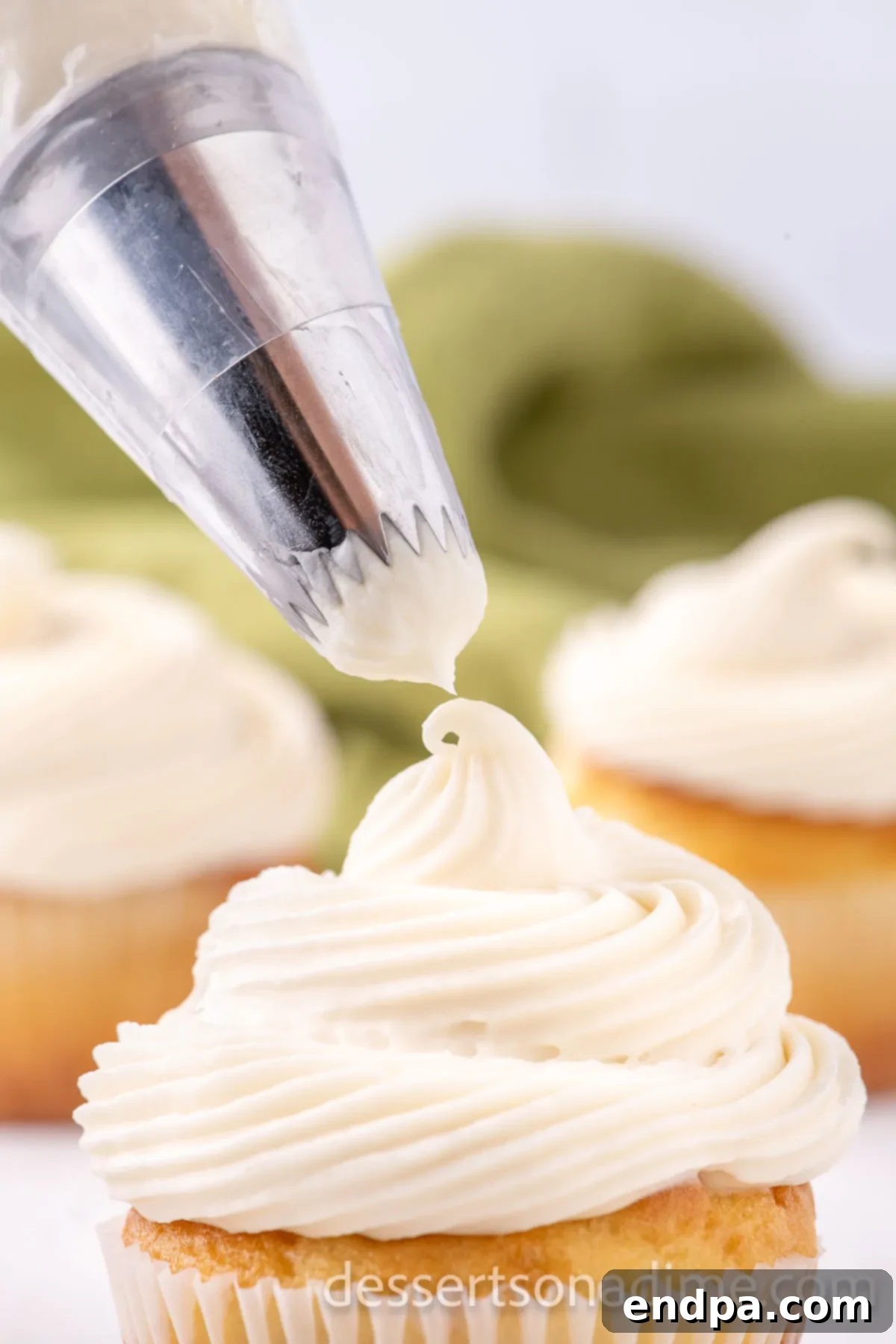 Velvety Maple Cream Cheese Frosting 8 Maple Cream Cheese Frosting on a cupcake