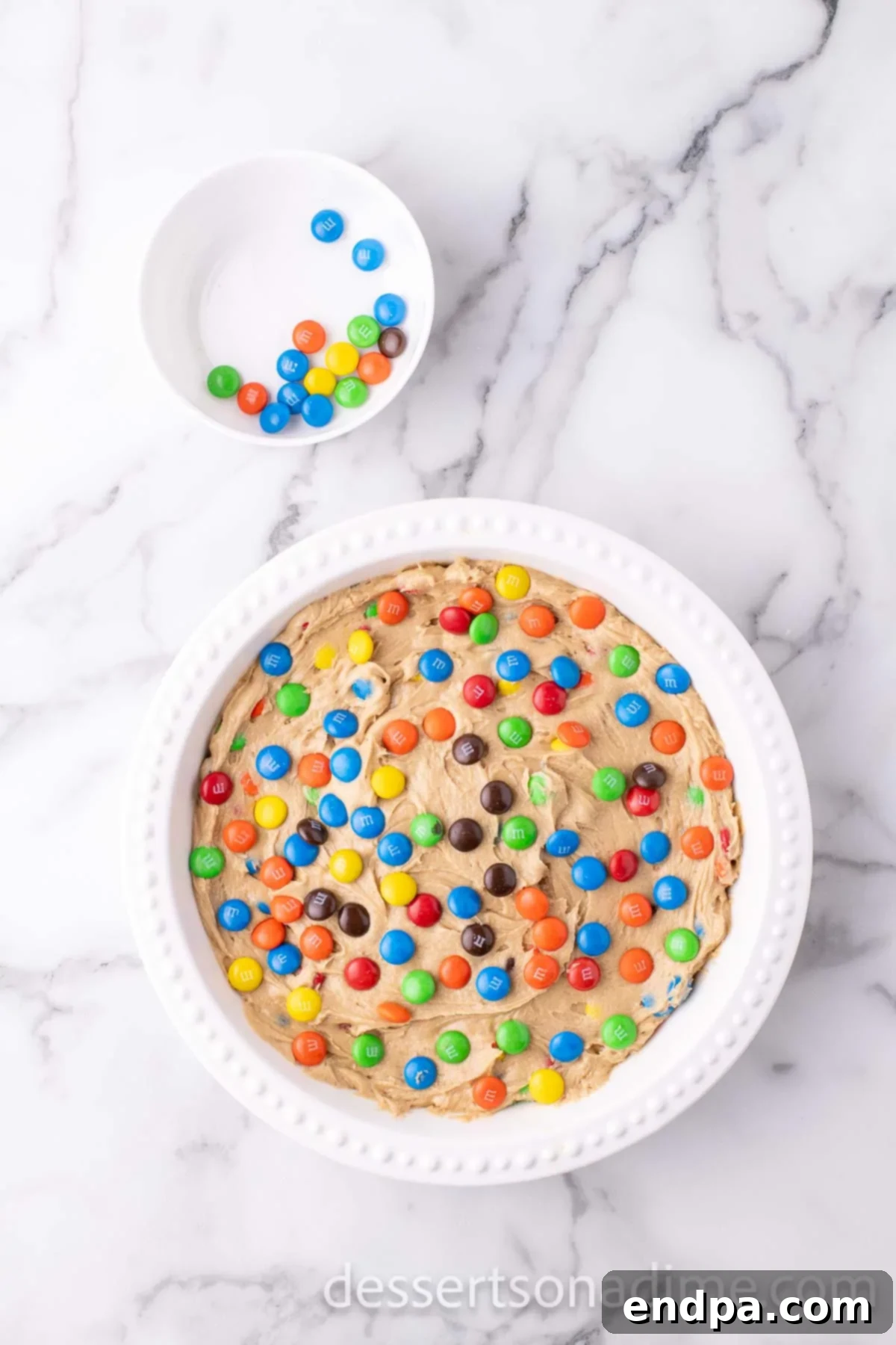 Cookie Cake mixture poured into pan.