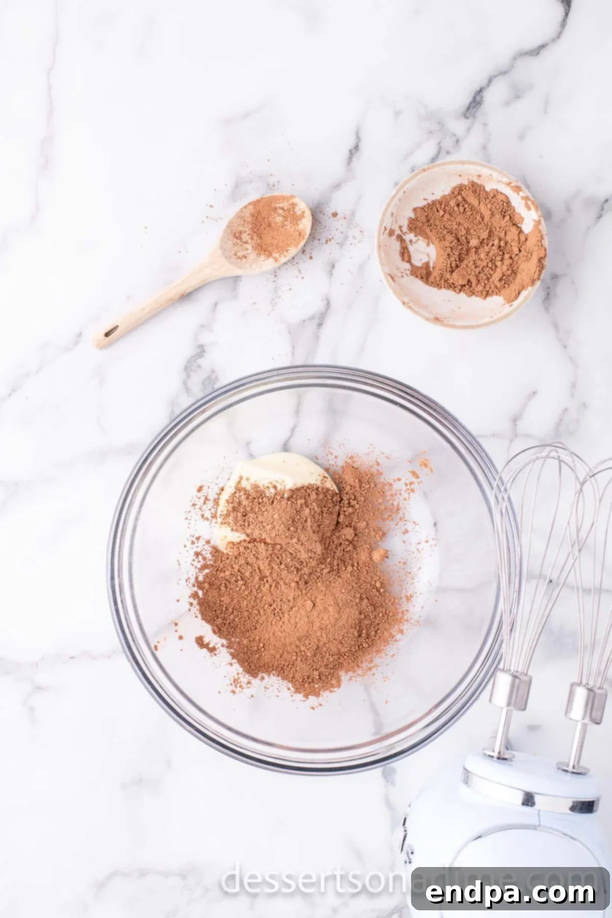 Frosting ingredients in mixing bowl.