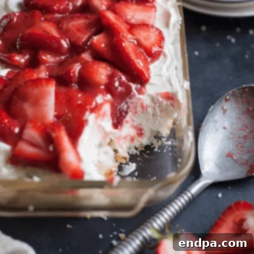 Strawberry Angel Food Cake Layered Lush, a free-form layered dessert with cake, cream cheese, whipped cream, and tangy berries.