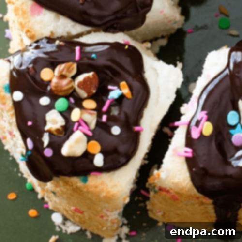 Festive Party Angel Food Cake, a colorful and exciting dessert made with homemade airy and fluffy angel food cake batter.