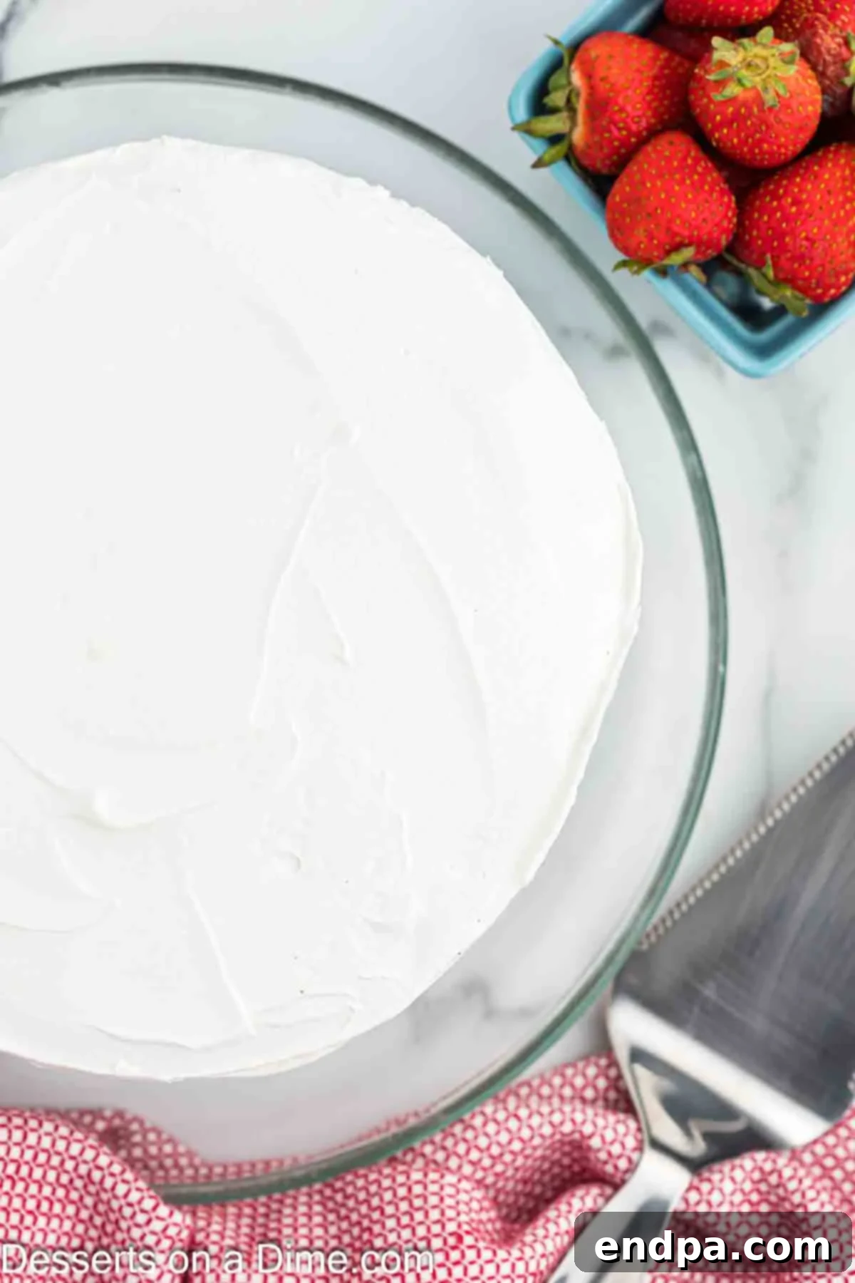 The Ultimate Atomic Cake 8 Whipped cream on cake.