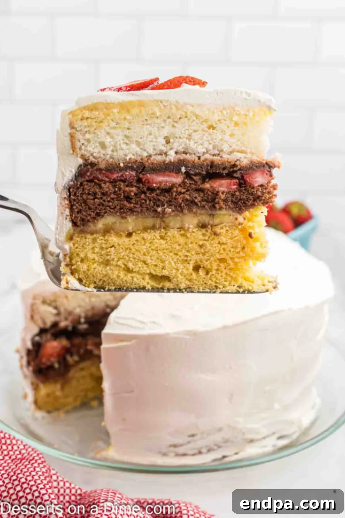 The Ultimate Atomic Cake 9 Atomic cake being sliced, showing its vibrant layers.