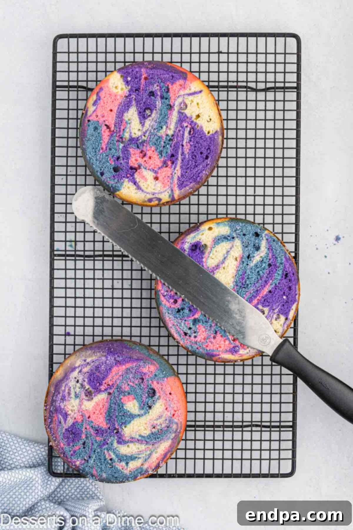 Cake layers leveled with a serrated knife to ensure flat tops.