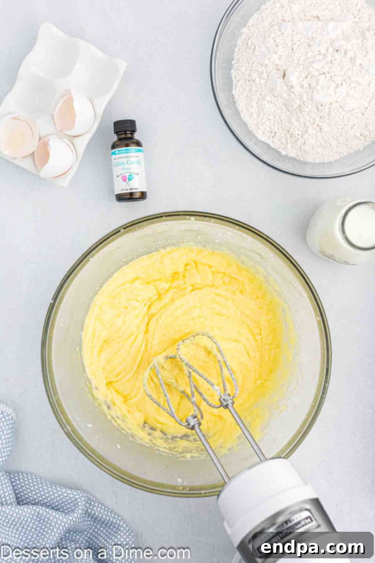 Eggs added to butter and sugar mixture and combined.