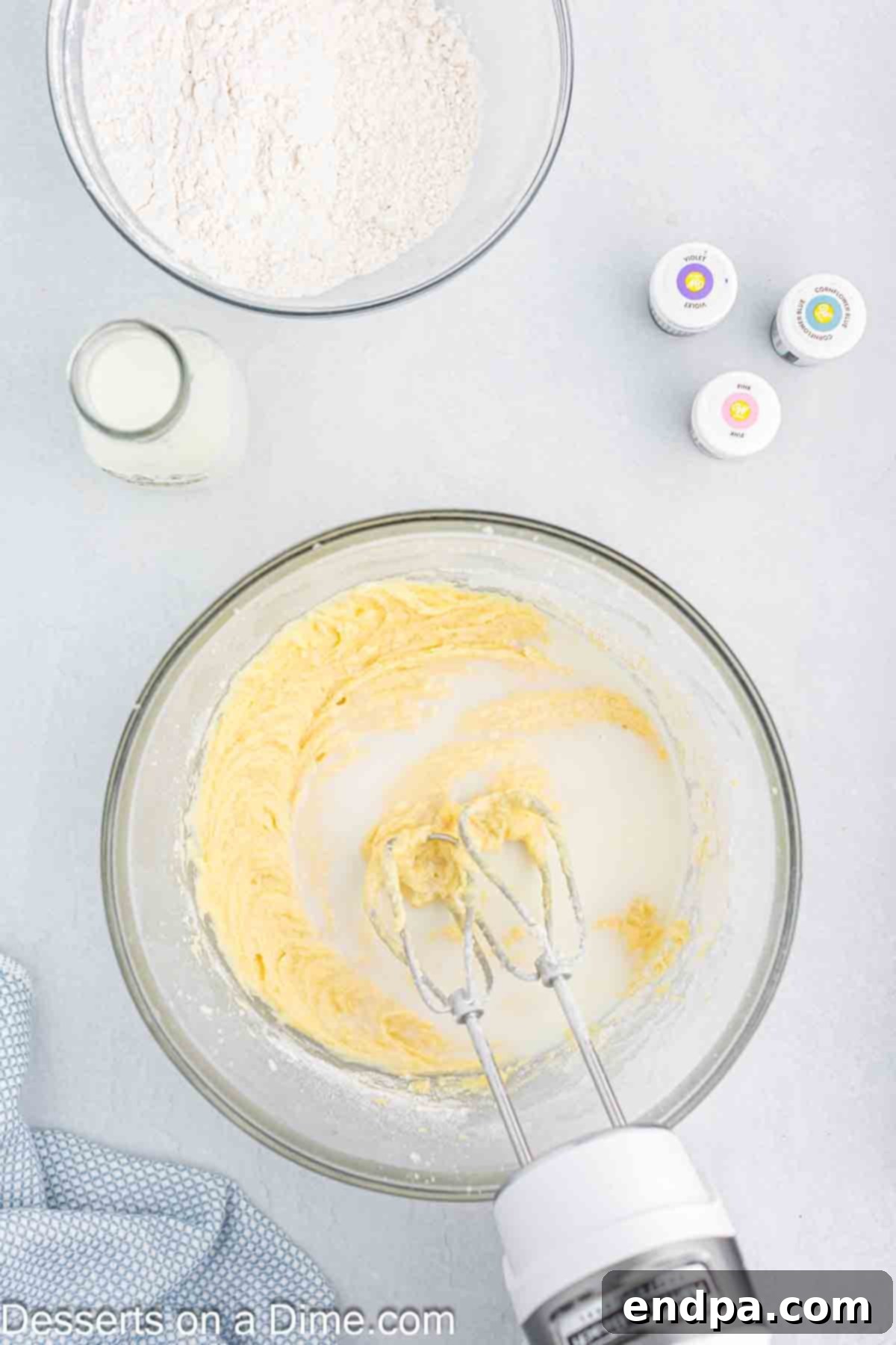 Flour mixture and milk gradually combined into the batter.