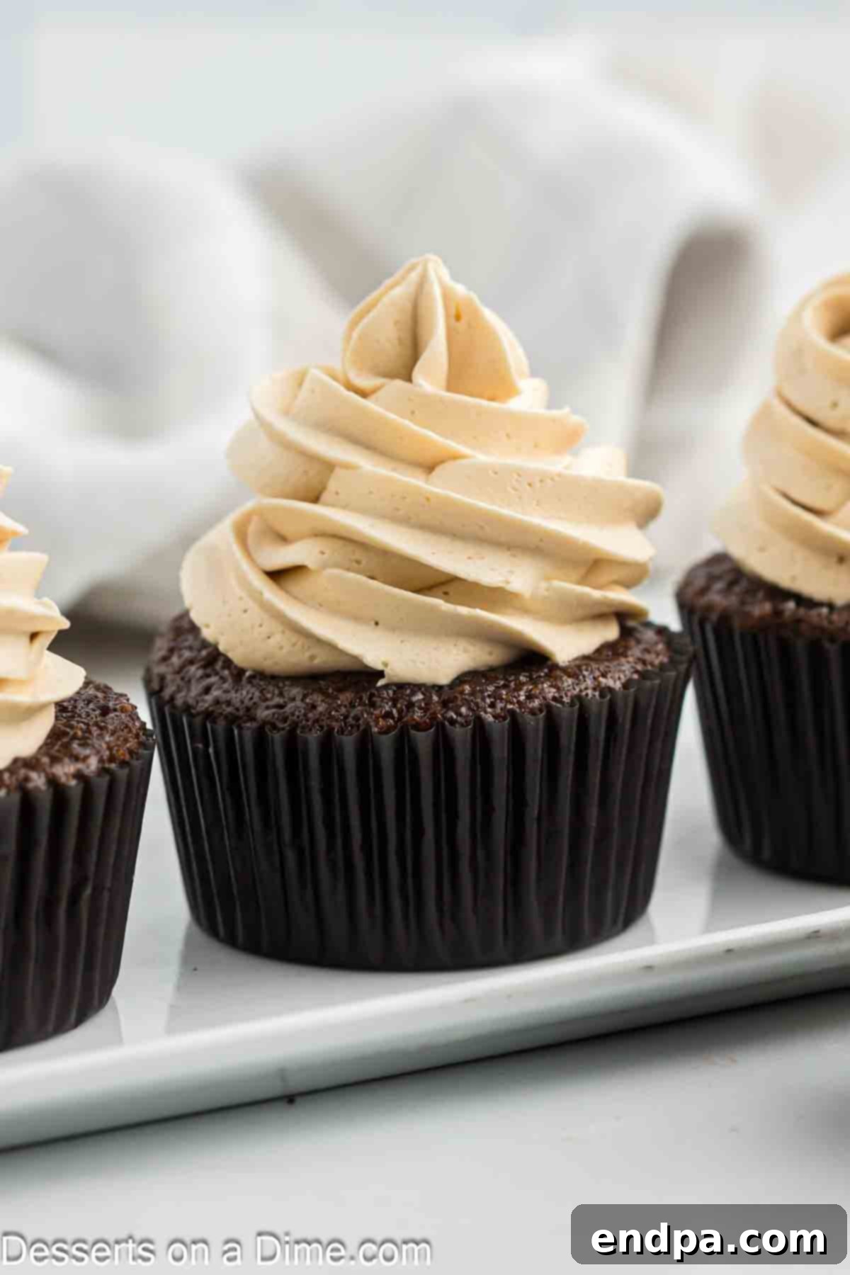 Decadent Mocha Treats 2 Mocha Cupcakes decorated and ready to enjoy.