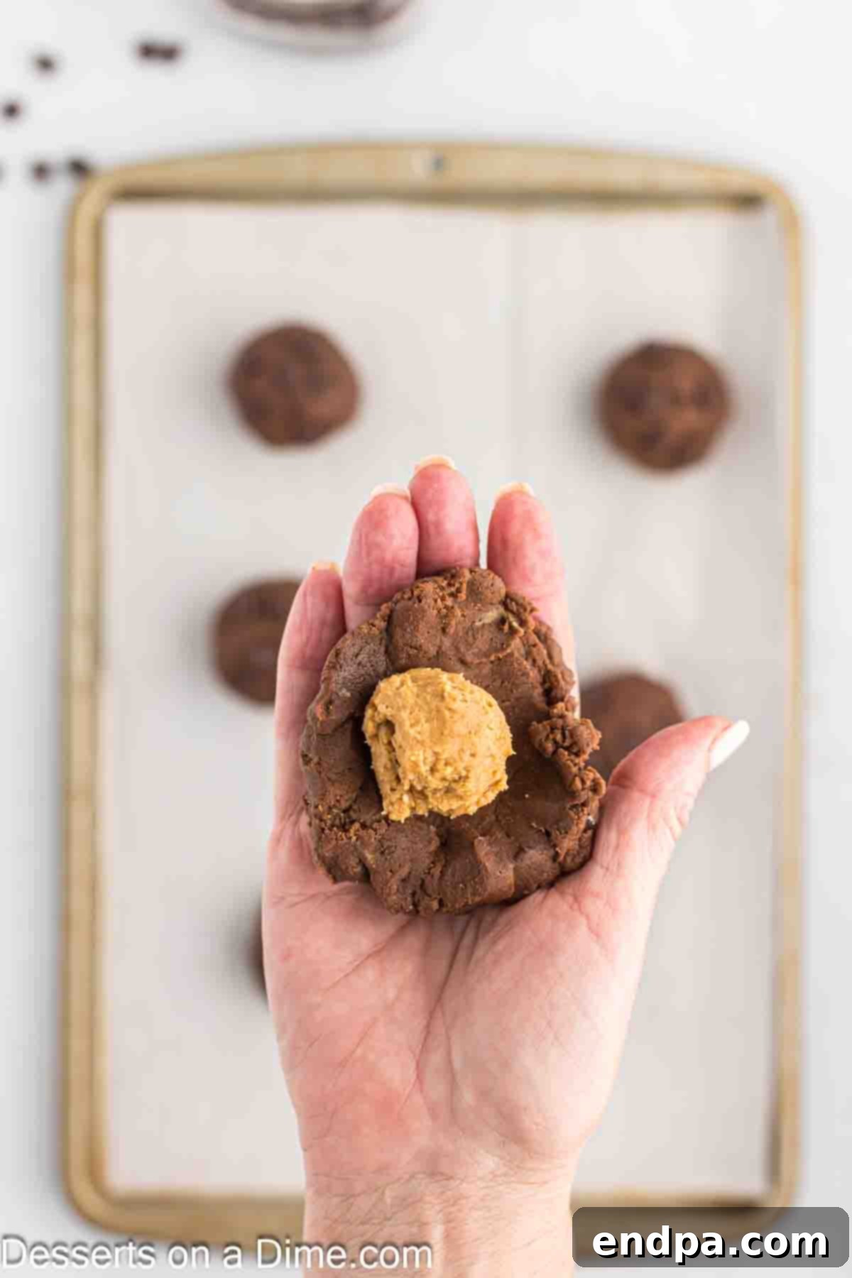 Cookie dough with peanut butter in the middle. 