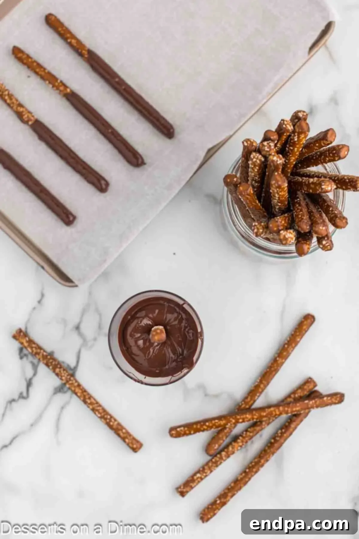 Touchdown Twists 4 Pretzel dipped in melted chocolate.