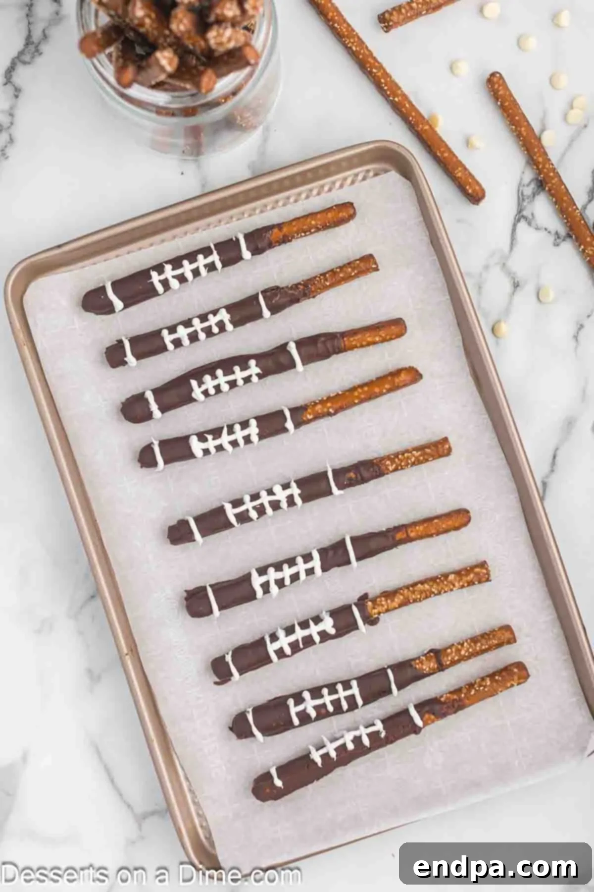 Touchdown Twists 7 White chocolate piped on pretzels.