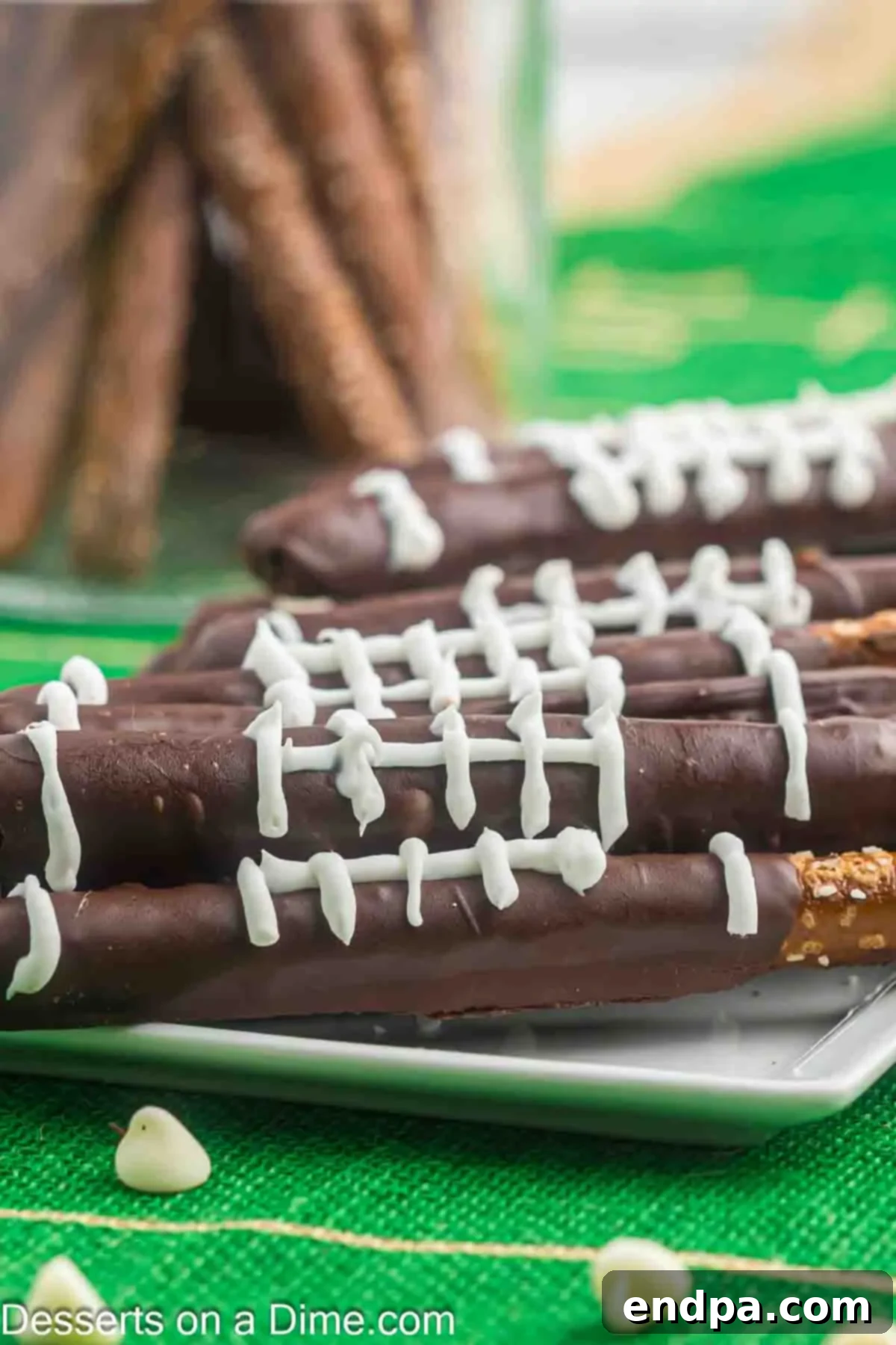 Touchdown Twists 8 Football Chocolate Covered Pretzel Rods on a platter
