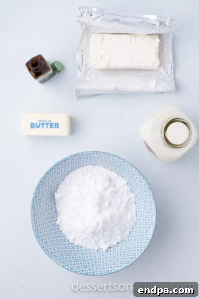 Close-up shot of the simple ingredients needed for cream cheese glaze: powdered sugar, butter, milk, and vanilla extract, laid out on a clean surface.