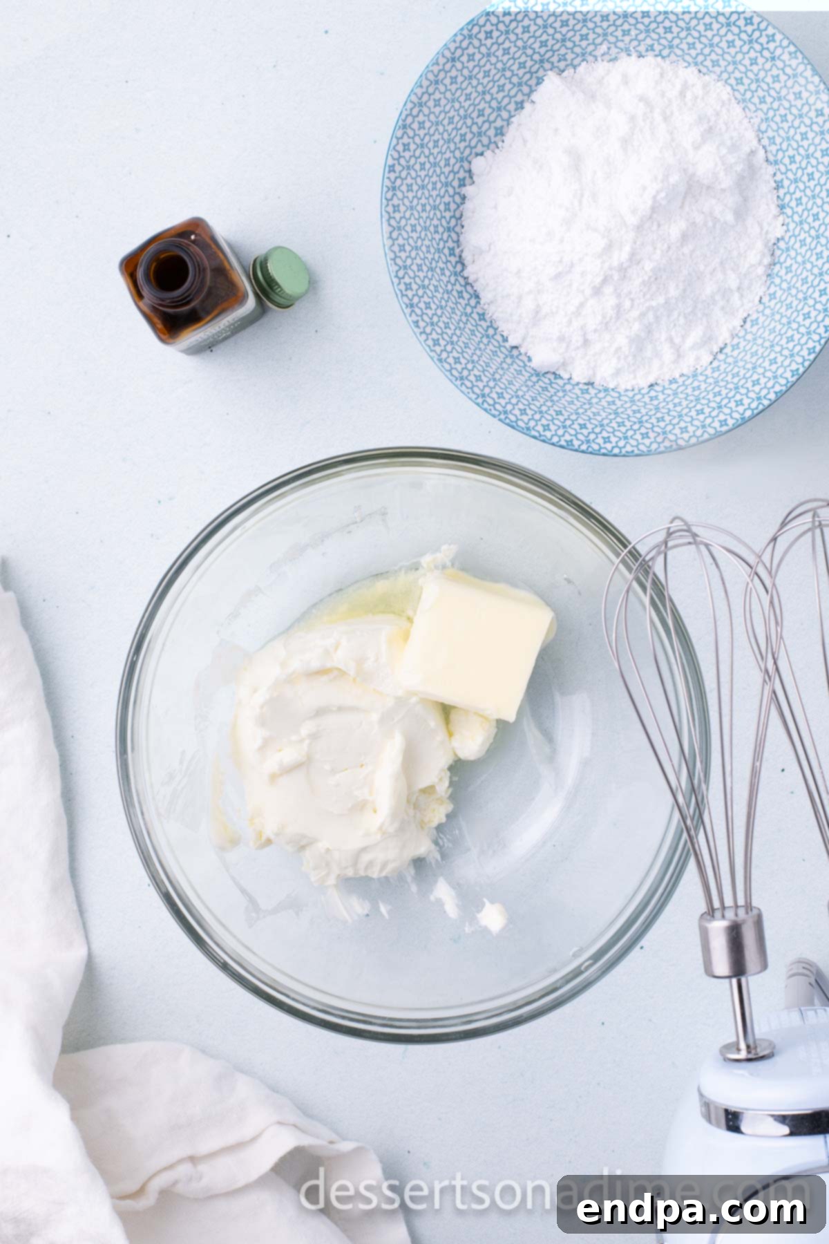 Step 1: Beating softened cream cheese and butter together in a large mixing bowl until smooth and creamy.
