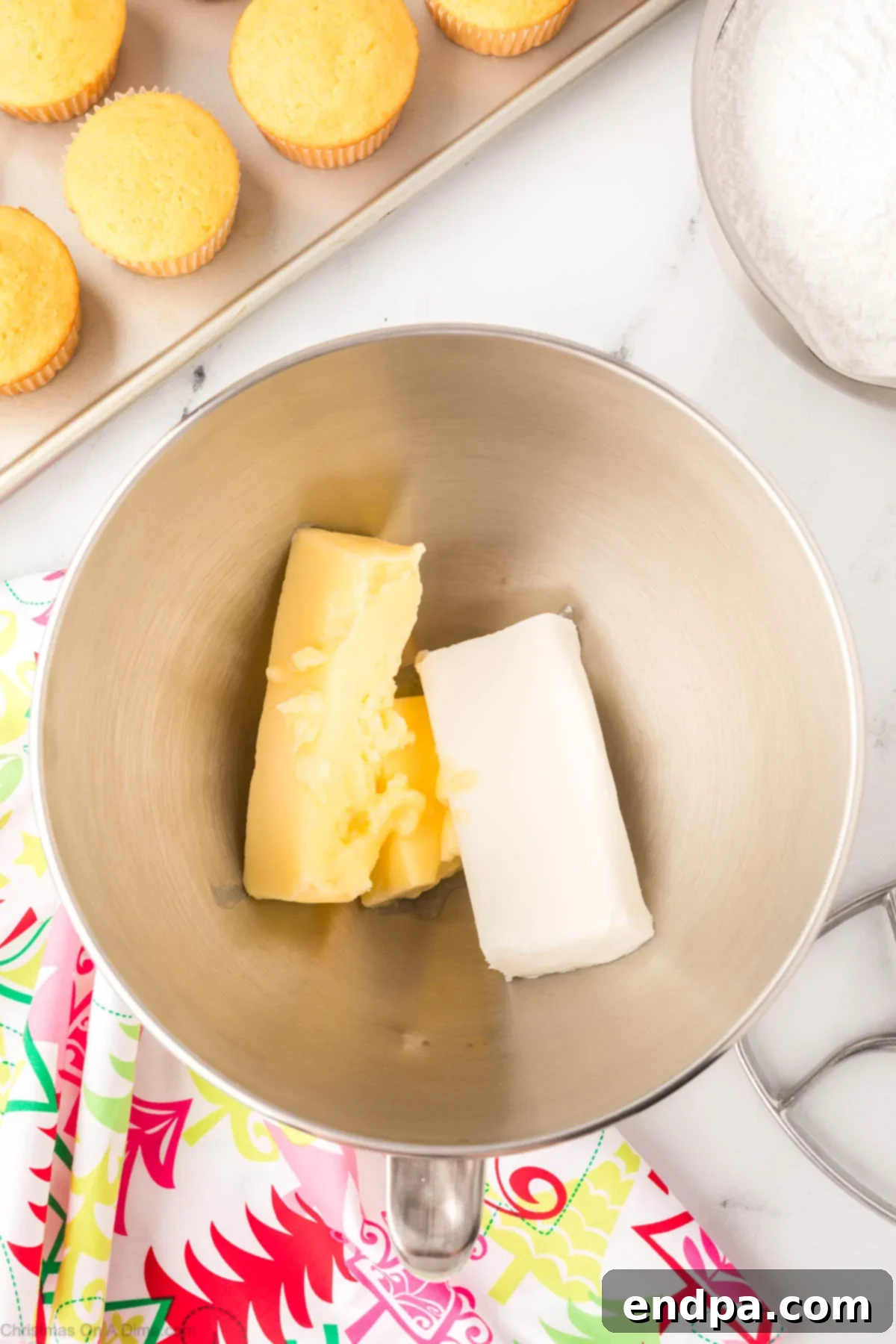 Softened butter and vegetable shortening in a stand mixer bowl.