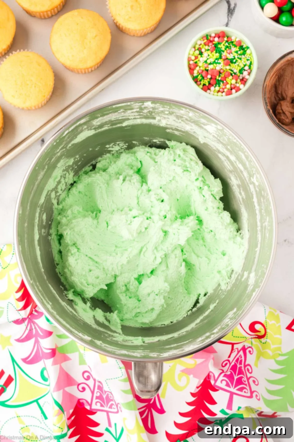 The majority of the frosting dyed green for the Christmas tree.