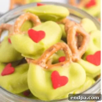 Sweet Yuletide Treasures 10 Grinch Pretzels, a perfect sweet and salty holiday treat made with just 3 ingredients, bursting with flavor.