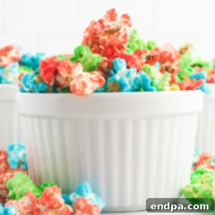 Sweet Yuletide Treasures 14 Candy Popcorn, a colorful sweet treat with a tasty candy coating, perfect for various parties.