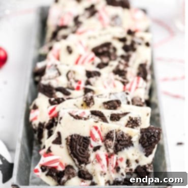 Sweet Yuletide Treasures 35 Oreo Peppermint Bark, a 3-ingredient holiday treat with white chocolate, crushed peppermint candy canes, and Oreos.