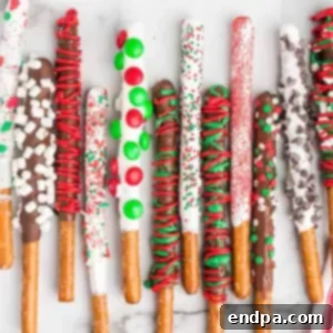 Sweet Yuletide Treasures 7 Christmas Chocolate Covered Pretzel Rods, perfect for homemade Christmas gifts, offering a delicious sweet and salty treat.