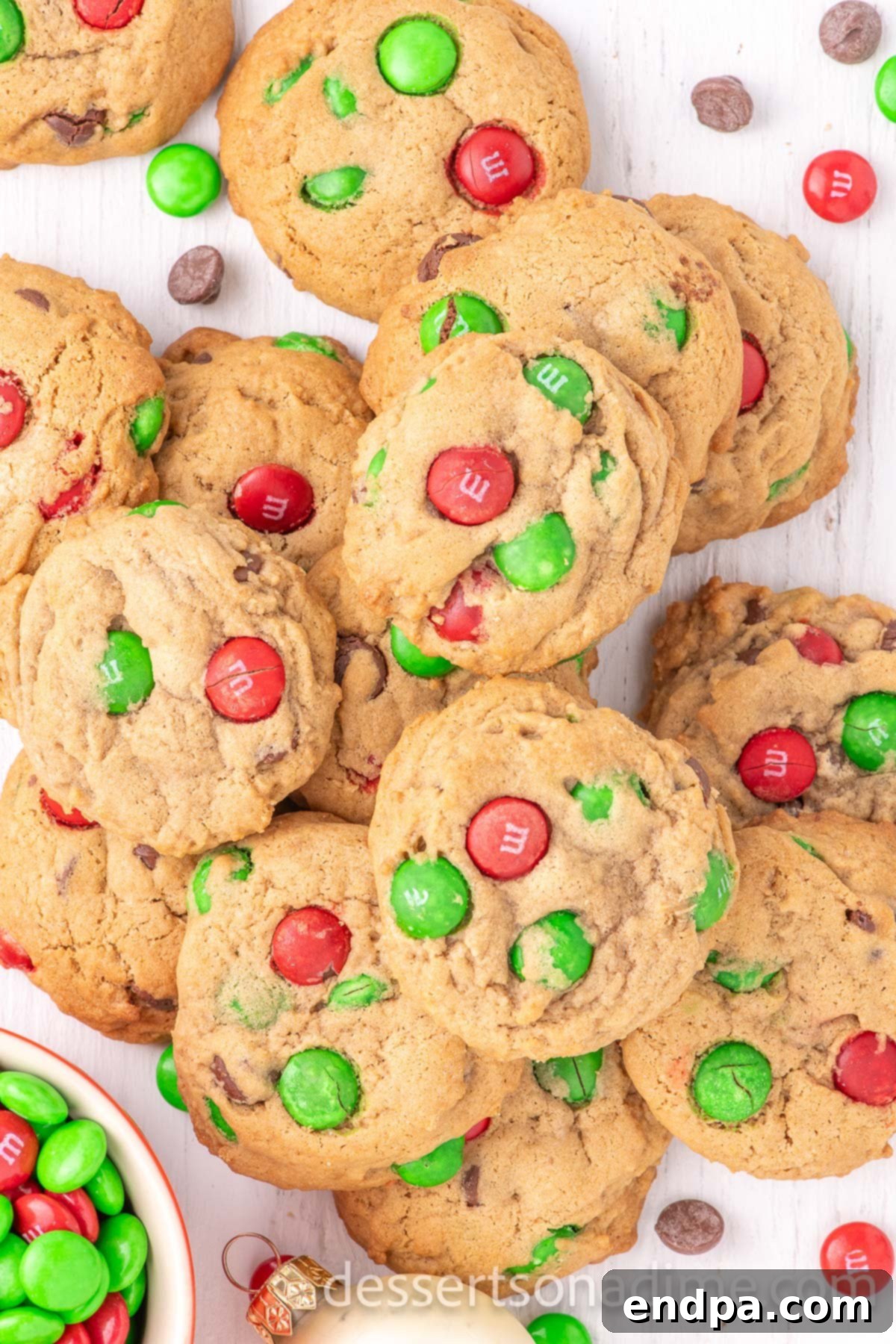 A festive platter piled high with freshly baked M&M Christmas Cookies, ready for serving.