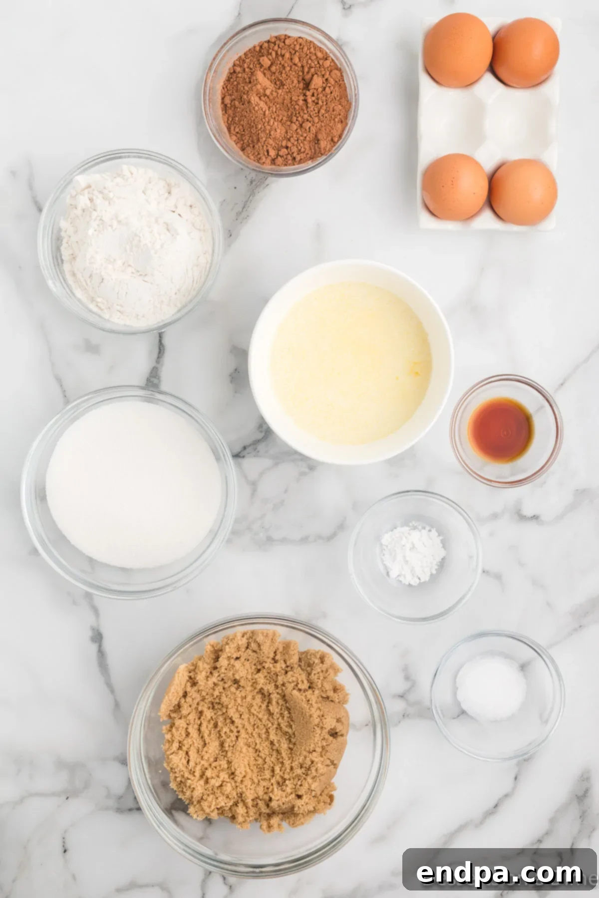 Football brownies ingredients- brown sugar, cocoa powder, flour, eggs, butter, vanilla extract. 