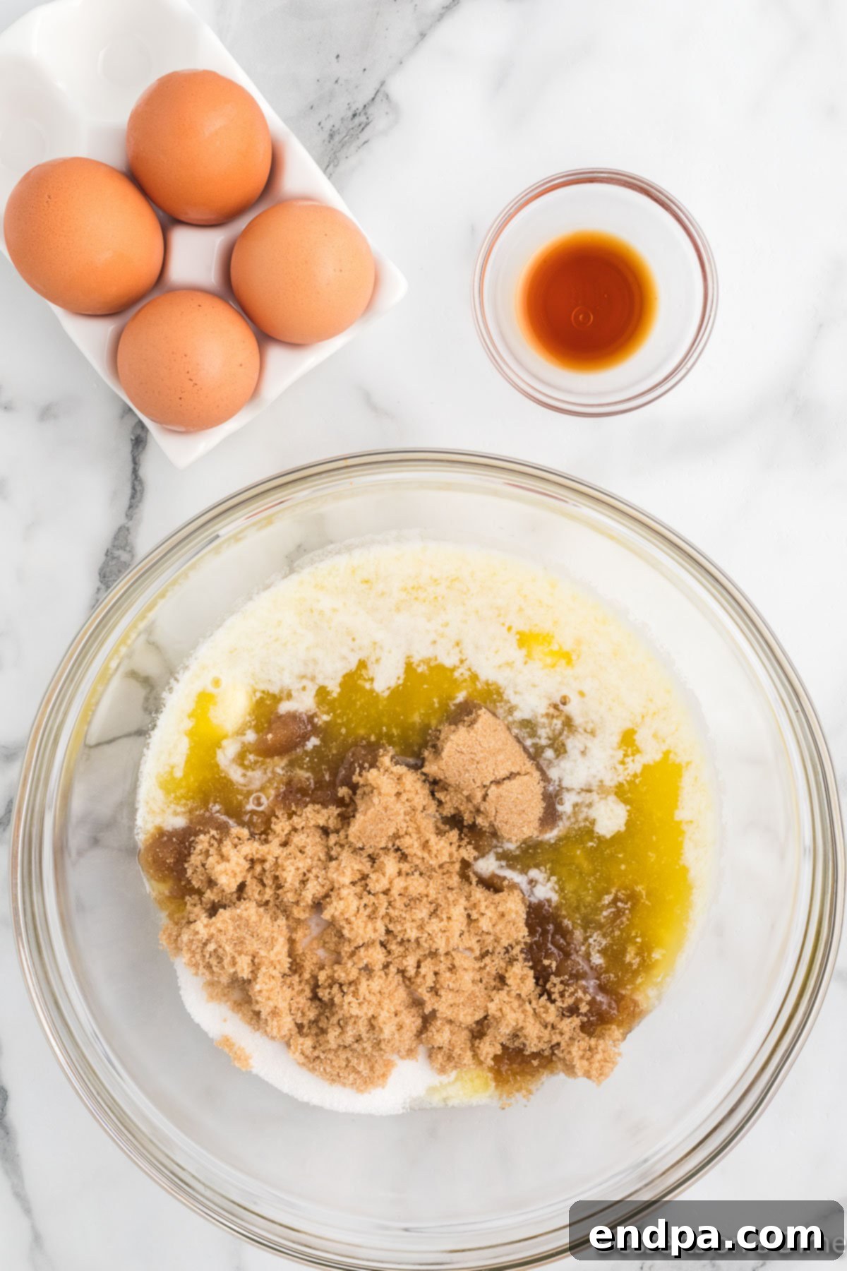 Sugar and vanilla mixed into egg mixture. 