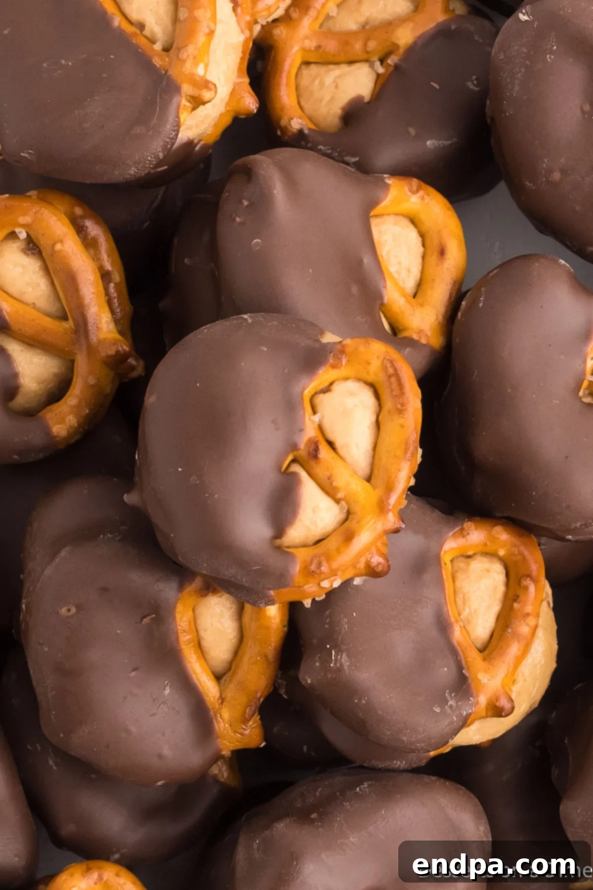 A close-up shot of perfectly finished Peanut Butter Pretzel Bites, artfully arranged and ready to be enjoyed.