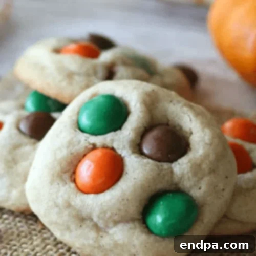 Buttery, chewy Pumpkin Spice M&M Cookies stuffed with delicious seasonal M&M's.