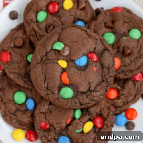Soft and chewy Chocolate M&M Cookies with gooey centers and crisp edges.