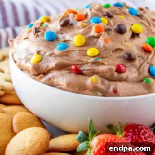 Deliciously chocolatey M&M Brownie Batter Dip, a fun and fast dessert.