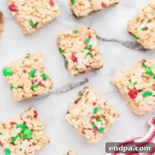 Festive M&M Christmas Rice Krispie Treats with holiday sprinkles.