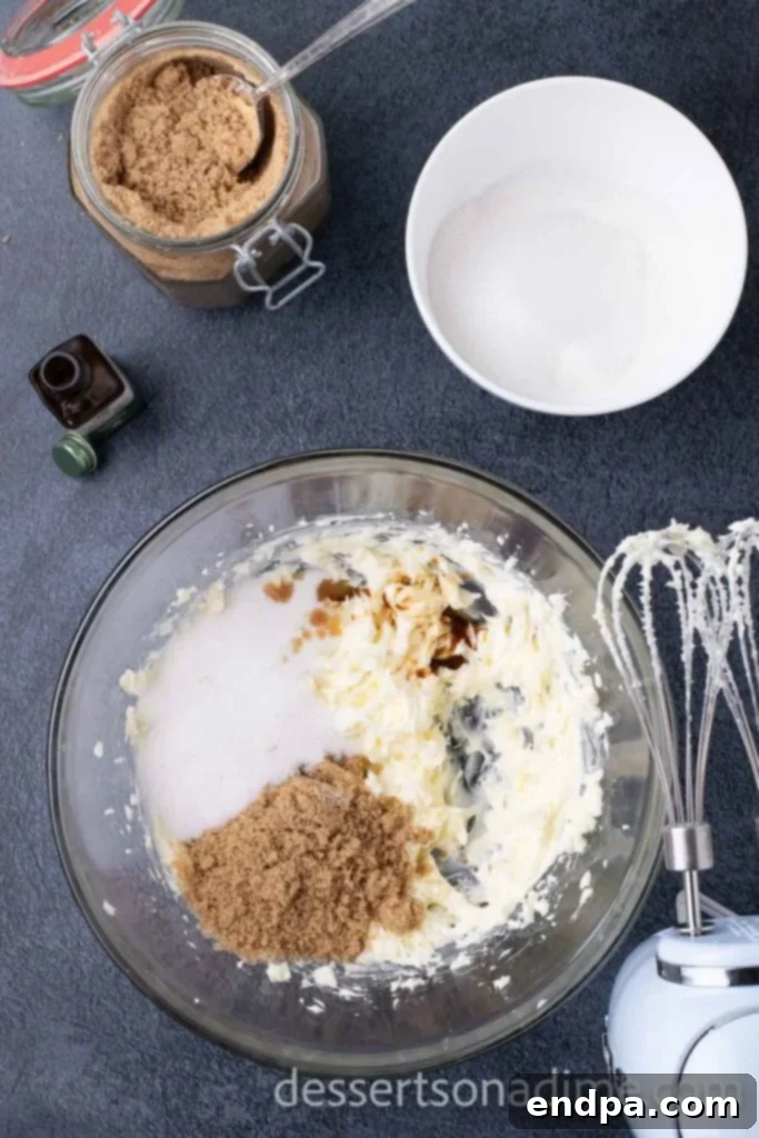 Hogsmeade's Secret Butterbeer Cookie Recipe 4 Mixing softened butter with brown and granulated sugars in a large bowl using an electric mixer.