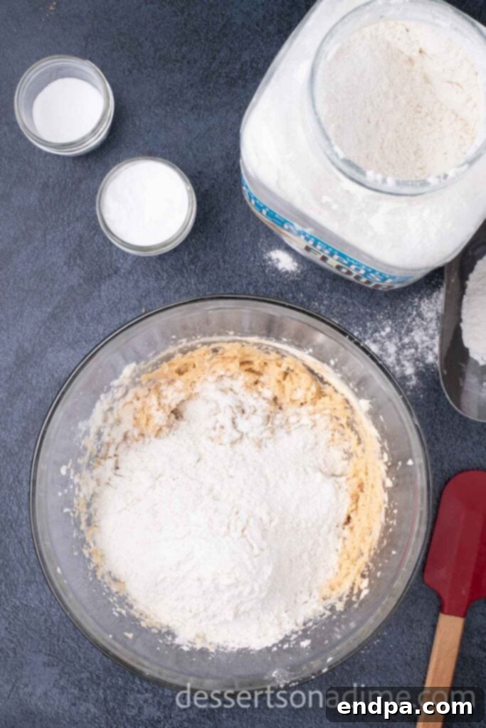 Hogsmeade's Secret Butterbeer Cookie Recipe 6 Gently stirring flour, baking soda, and salt into the wet ingredients to form the cookie dough.