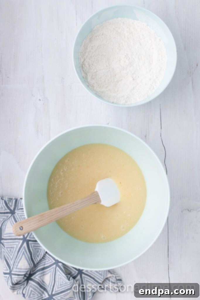 Heavenly Snickerdoodle Cupcakes 6 Adding dry ingredients to the wet ingredients