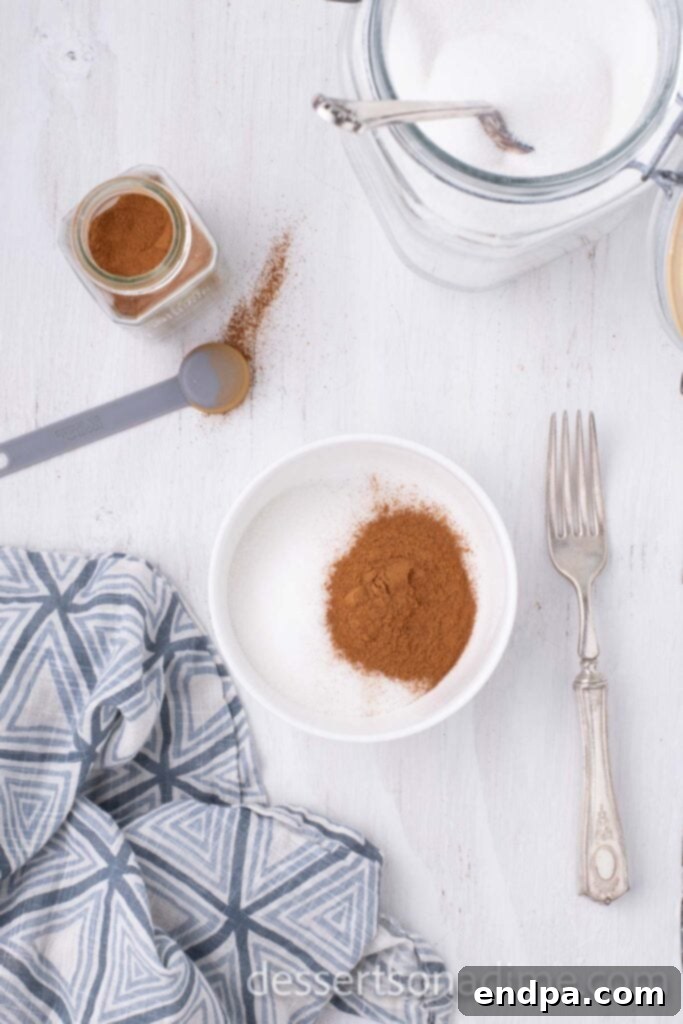 Heavenly Snickerdoodle Cupcakes 7 Mixing the cinnamon and sugar together in a bowl
