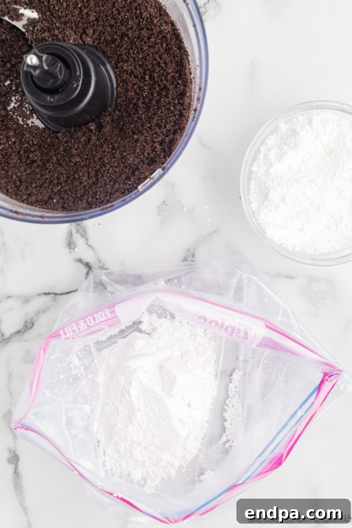 Powdered sugar and finely crushed Oreos placed into a large ziplock bag.