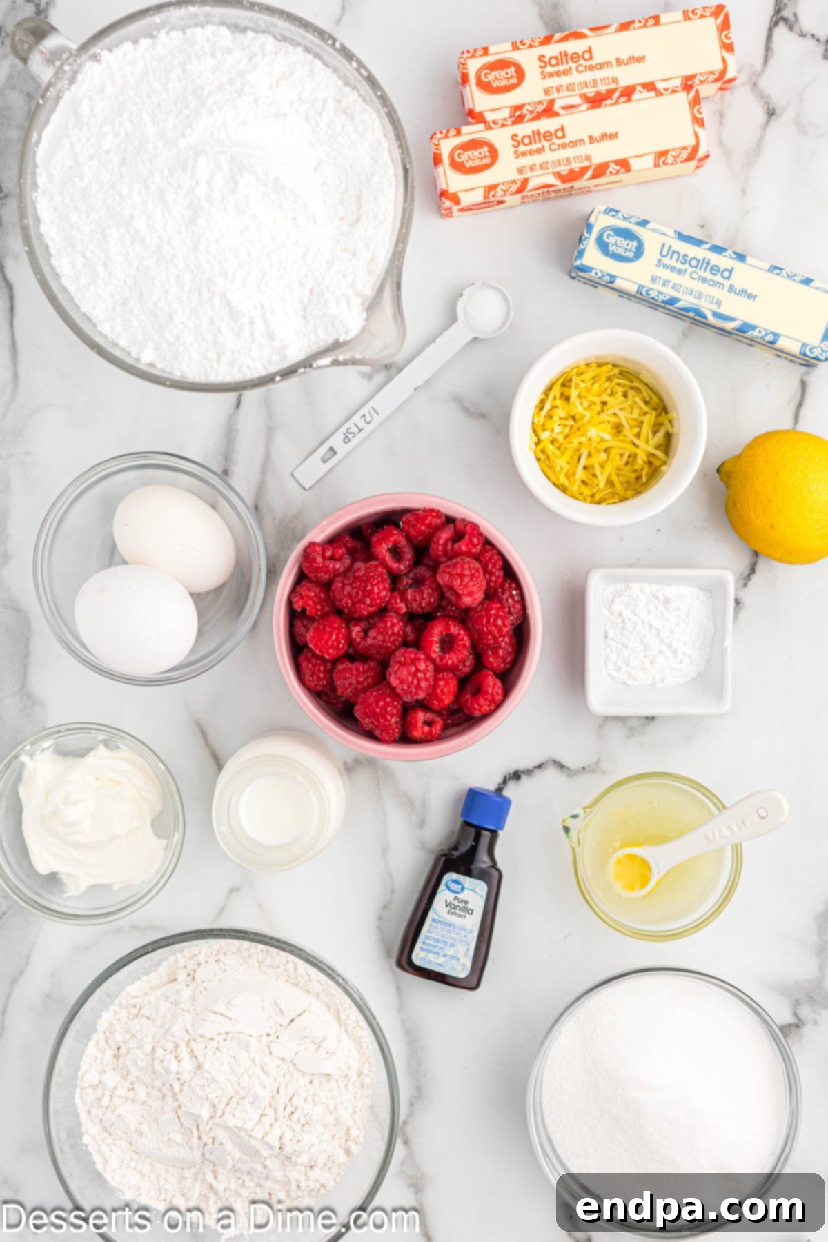 Zesty Lemon Raspberry Cupcakes 3 Ingredients for Lemon raspberry cupcakes: flour, butter,sugar, eggs, vanilla, lemon uice, lemon zest, milk, sour cream, raspberries, lemon juice, butter and powdered sugar.