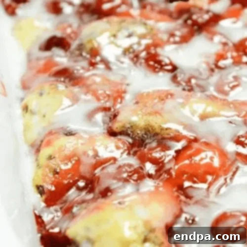 Ultimate Cobbler Collection 9 Crockpot Cinnamon Roll Cherry Cobbler, a quick and easy dessert or breakfast.