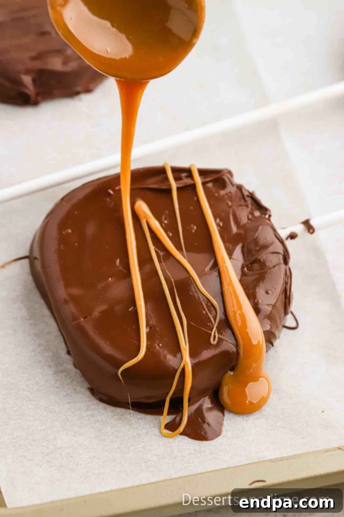 Melted caramel drizzled on an apple.