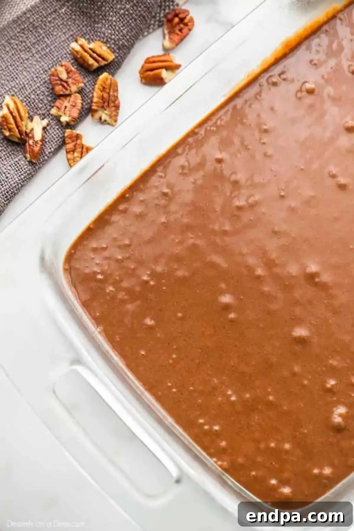Brownie batter in a baking dish. 