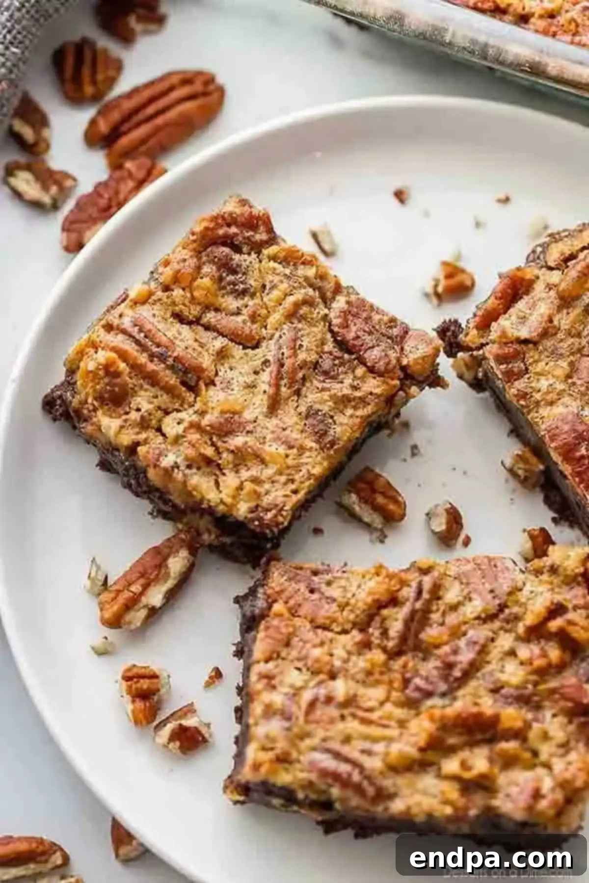 Pecan Pie brownies on a white plate