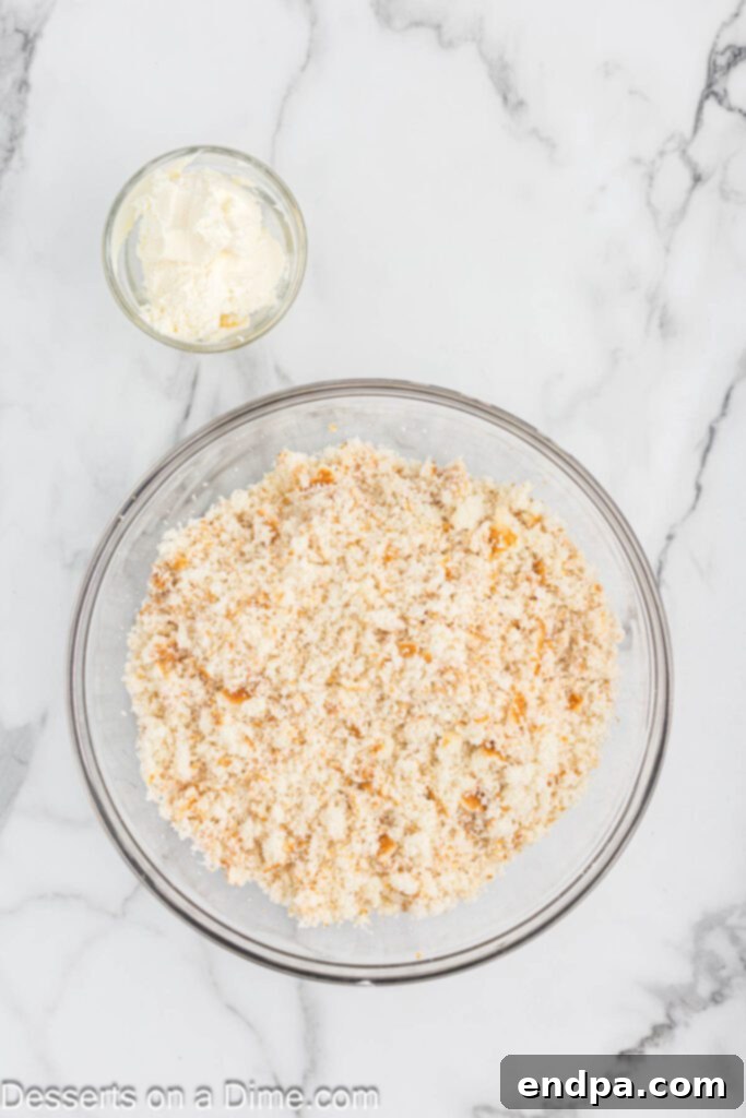 Dessert Pops 4 A mixing bowl filled with crumbled cake and frosting, ready to be combined into the cakesicle filling.
