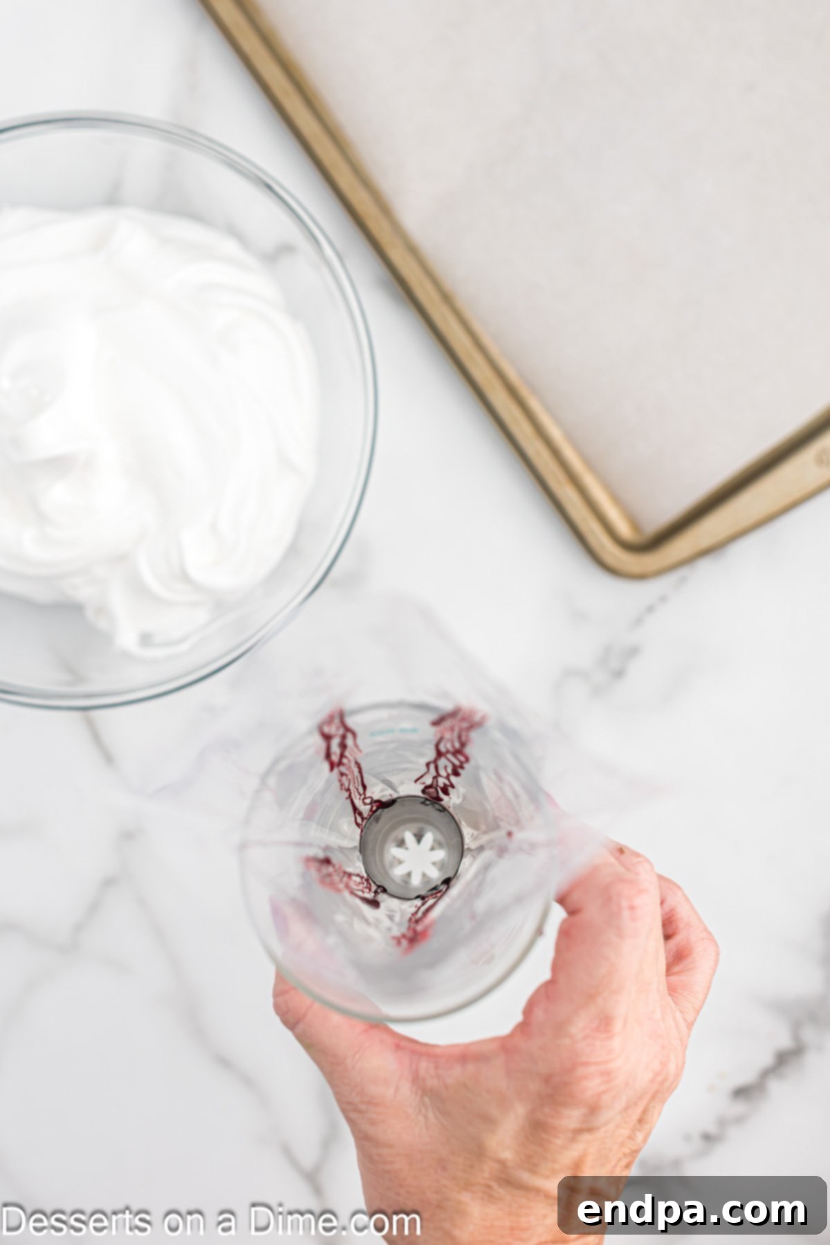 Peppermint Cloud Kisses 6 Piping bag prepared with red food coloring stripes inside, ready for meringue filling.