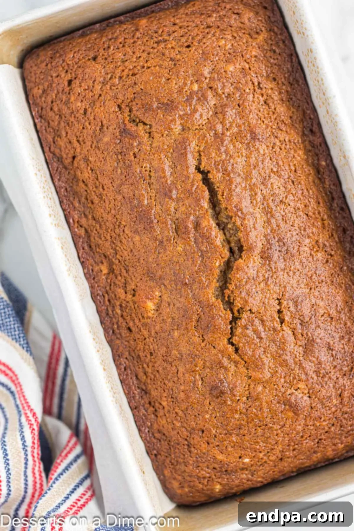 Baked applesauce bread, golden brown and perfectly risen.
