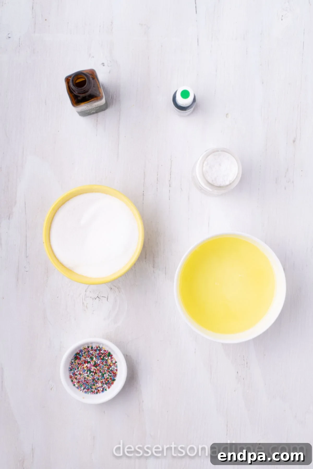 Festive Meringue Christmas Trees 3 Ingredients for recipe - egg whites, cream of tartar, sugar, green food coloring, spirnkles.