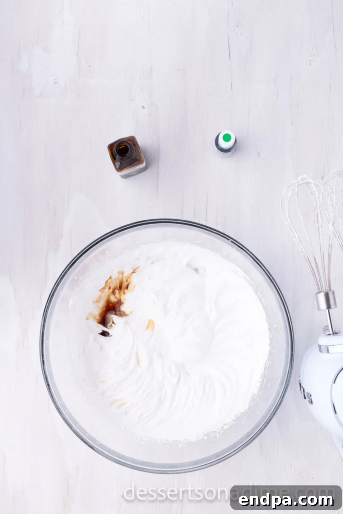 Festive Meringue Christmas Trees 6 Vanilla extract added to the bowl.