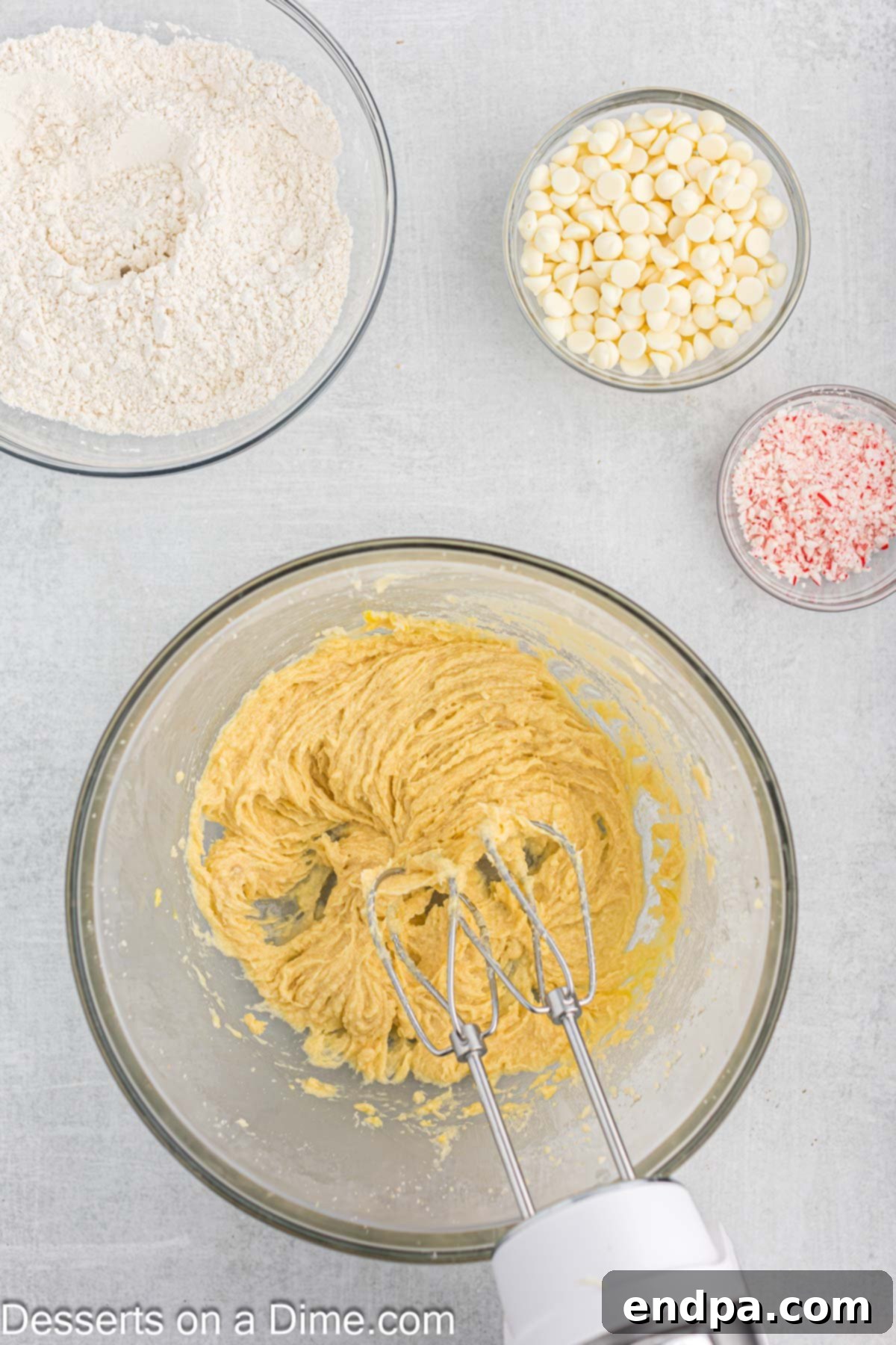 Peppermint White Chocolate Delights 5 Butter in a mixing bowl being creamed together with sugars.