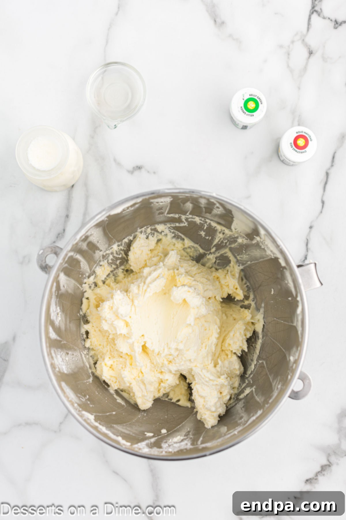 Gaudiest Garment Bake 6 Powdered sugar gradually combined with creamed butter in a mixing bowl.