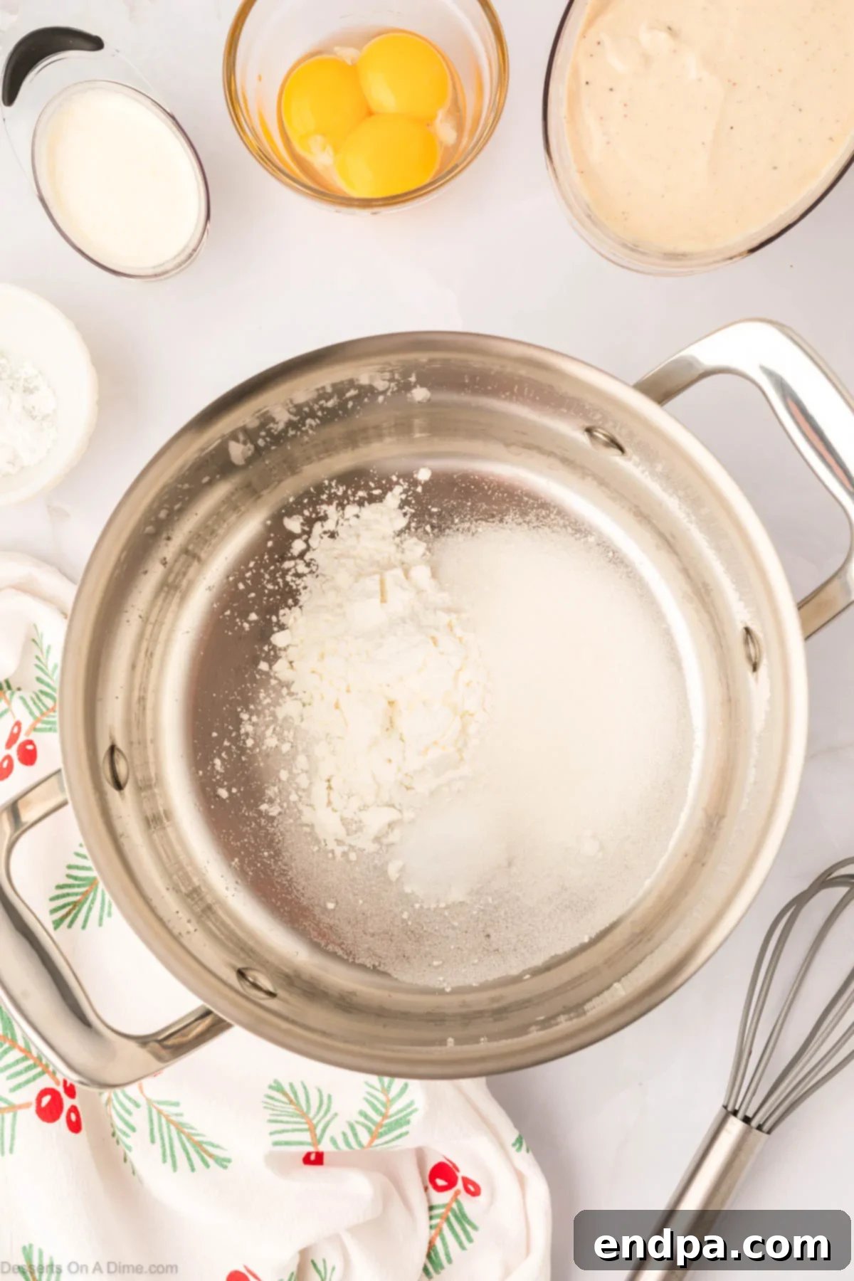 A heavy-bottomed pot containing dry ingredients: granulated sugar, cornstarch, a pinch of salt, and ground cinnamon, prepared for whisking in liquid components.